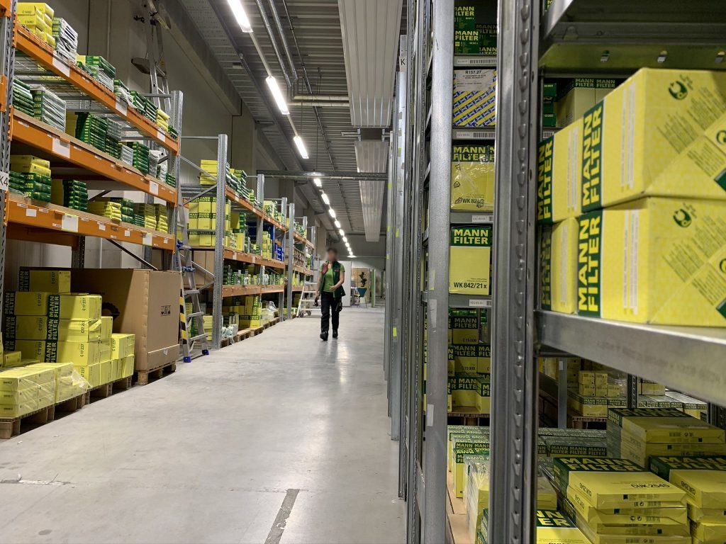 walking-woman-in-the-warehouse